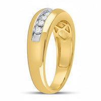 The 10k Gold Round Diamond Wedding Band 1/2 Cttw features a polished finish and three round diamonds set in a white metal accent across the top.