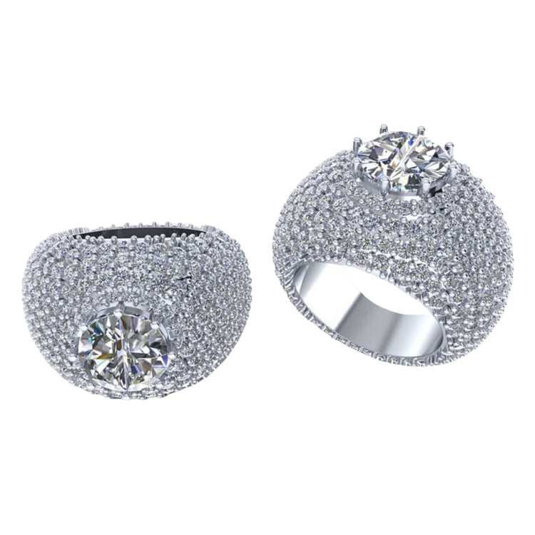 The Domed Solitaire Diamond Ring – 15.21 CT Gold Design features a bold, wide style with a large central diamond and is adorned with sparkling smaller diamonds, creating a brilliant shimmer from every angle.