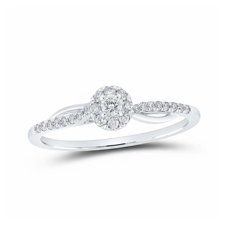 The 10k Yellow Gold Round Diamond Halo Promise Ring 1/5 Cttw features a round center diamond with a sparkling halo and additional diamonds on the delicate band for timeless elegance.