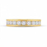 The 14k Gold Diamond Wedding Band 1 Cttw features a single row of round, sparkling white diamonds set in 14k gold, showcased against a plain white background.