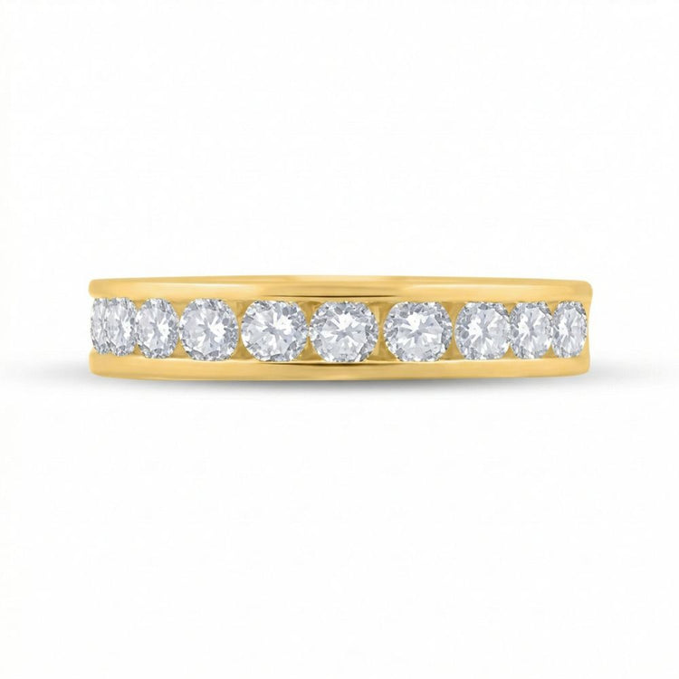 The 14k Gold Diamond Wedding Band 1 Cttw features a single row of round, sparkling white diamonds set in 14k gold, showcased against a plain white background.