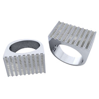 Two silver Baguette Stack Diamond Rings – 1.56 CT Gold Design, each with wide rectangular faces encrusted in grid-set clear stones; one ring stands upright while the other lies on its side, evoking classic baguette diamond style.