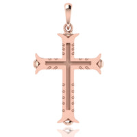 The 14k Gold Ornate Cross Pendant showcases textured inner details and engraved edges, complemented by a smooth bail for easy chain attachment—a timeless blend of elegance and classic religious symbolism.