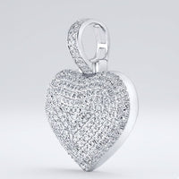 A dazzling 10K Gold Diamond Heart Pendant 3/4 Cttw Charm features multiple rows of sparkling diamonds and a gem-studded bail, displayed against a plain light gray background.