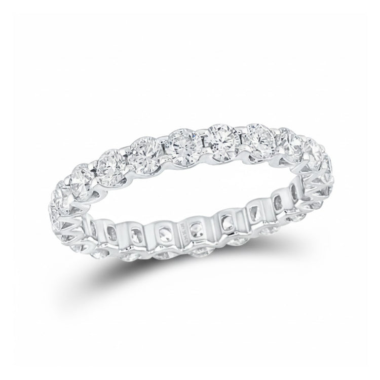 The 14k White Gold Diamond Eternity Ring 2 Cttw showcases a continuous row of round, brilliant-cut diamonds in prong settings, offering sparkling elegance—an ideal choice for a wedding band or anniversary gift.