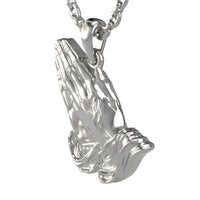 A 14k gold praying hands pendant shaped like two hands pressed together in prayer, detailed with realistic fingers and draped sleeves.