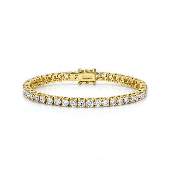 Tennis Bracelet - 14k Gold Moissanite 14K gold tennis bracelet with D color, VVS moissanite stones. Available in yellow, white, or rose gold. Brilliant, ethical, and crafted to perfection.