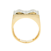 The 0.73 CTW Natural Diamond Cluster Ring in 14k yellow gold features a flat rectangular top with a raised bow-shaped design set with natural diamonds, finished with a plain, smooth band for a sophisticated look.