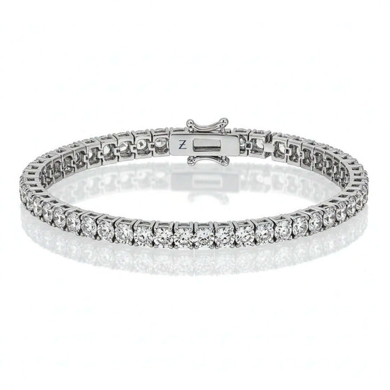 alt=" 14K gold tennis bracelet with G+ VS natural diamonds. Timeless elegance, secure clasp, and expert craftsmanship. Perfect for any occasion. "