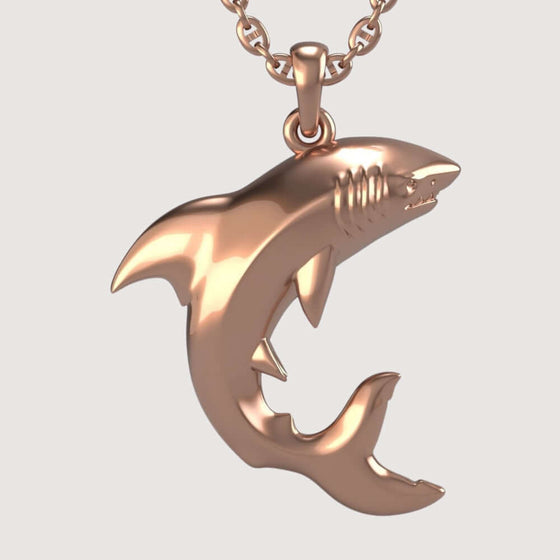 14k Gold Shark PendantDiscover the 14K Gold Shark Pendant. A bold and dynamic men’s gold pendant crafted from 14K solid gold, showcasing a sleek shark design with radiant polish.