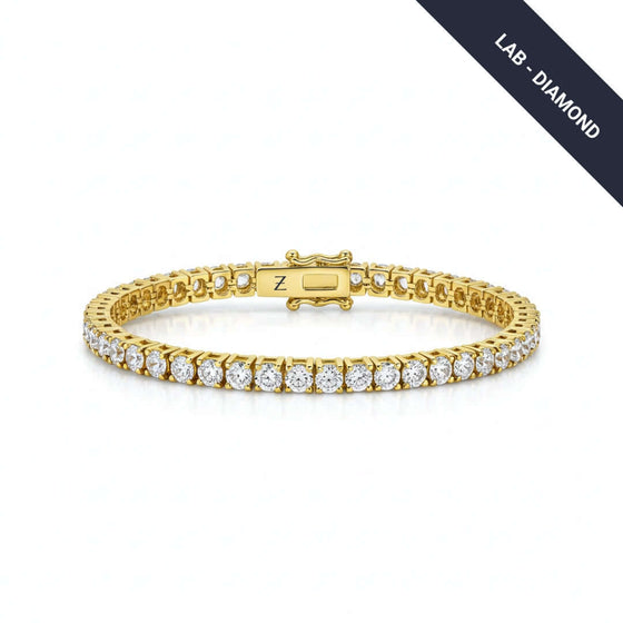 Tennis Bracelet - 14k Gold Lab Grown Diamonds 14K gold tennis bracelet featuring E-F VS lab-grown diamonds. Ethically crafted for timeless style. Available in yellow, white, or rose gold.