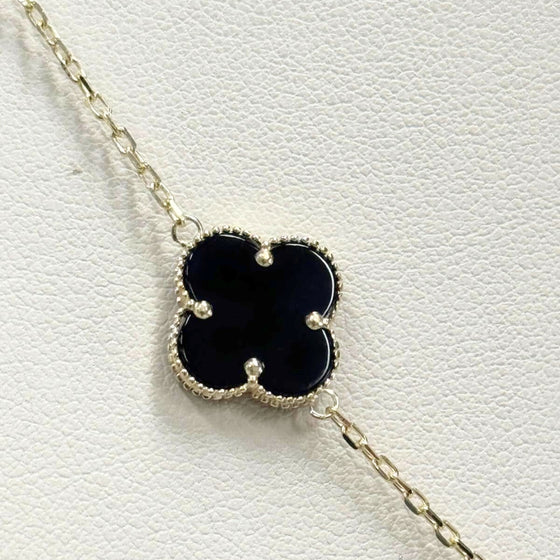 Onyx Four Leaf Clover Necklace - 14k Yellow Gold Discover the beauty of our 14k yellow gold onyx four leaf clover necklace. A timeless symbol of luck in a modern design. Free shipping available!