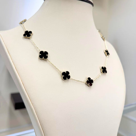 Onyx Four Leaf Clover Necklace - 14k Yellow Gold Discover the beauty of our 14k yellow gold onyx four leaf clover necklace. A timeless symbol of luck in a modern design. Free shipping available!