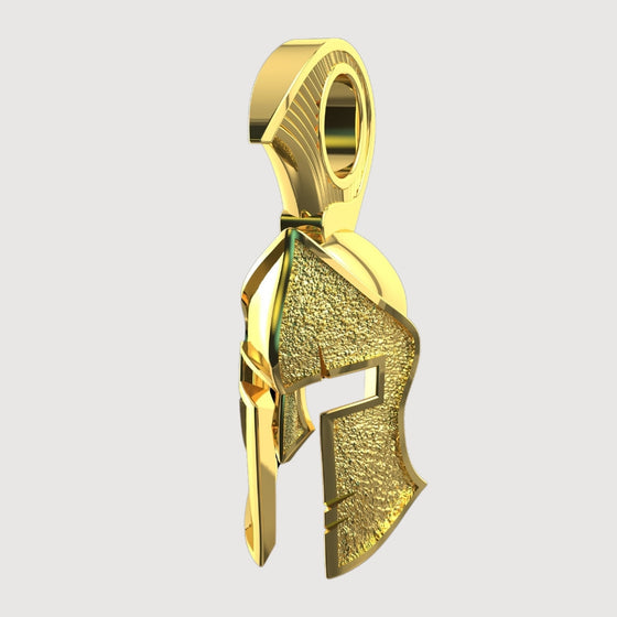 14k Gold Heroic Spartan Helmet PendantDiscover the 14K Gold Heroic Spartan Helmet Pendant. A bold, intricately crafted gold pendant for men, designed to symbolize strength and sophistication.