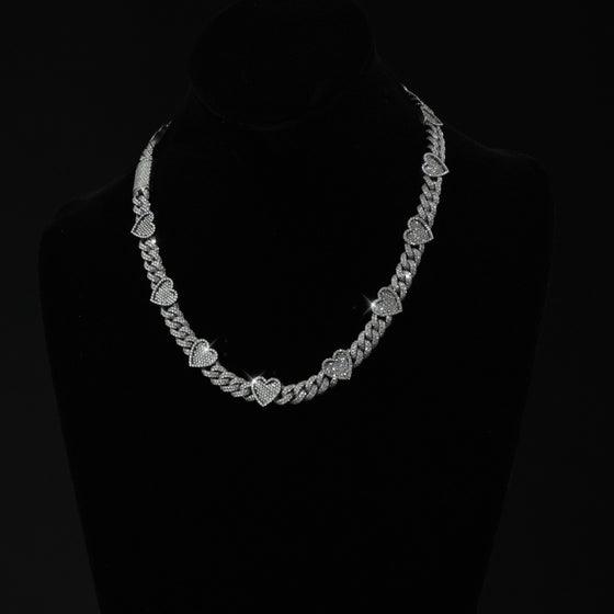 alt=" 10k white gold heart chain featuring 15 CT G+ VS natural diamonds. Elegant, unique, and expertly crafted for timeless luxury and romance. "