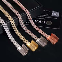 Four Moissanite Cuban Link Chain - 8mm pieces in silver, gold, two-tone, and rose gold gleam on a black surface near a certificate card and box. Each features a large clasp encrusted with VVS moissanite on 925 sterling silver.