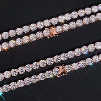 The Rose Gold Moissanite Tennis Chain Bracelet - 8mm features round, clear moissanite stones set closely on a rose gold base, arranged diagonally on a black background. The gems reflect colorful light for a stunning shimmer effect.