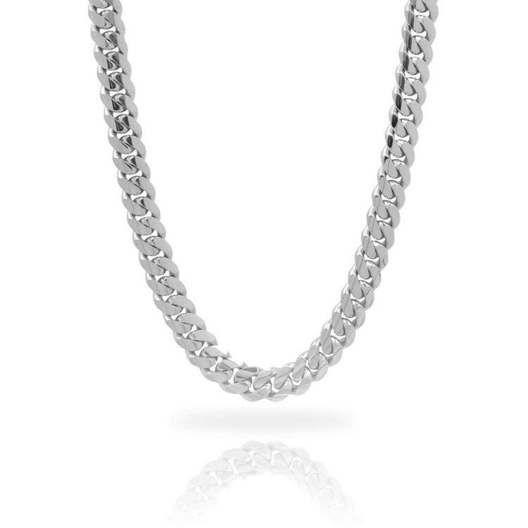 A close-up of the lower half of the 9mm Handmade Miami Cuban Link Chain in 10K, 14K, or 18K solid gold against a white background, showing its thick links with a slight reflection below.
