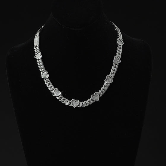 alt=" 10k white gold heart chain featuring 15 CT G+ VS natural diamonds. Elegant, unique, and expertly crafted for timeless luxury and romance. "