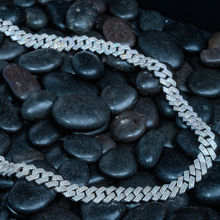  Shop 9mm Iced-Out Cuban Link Chain. Featuring 3 Row 16.57ctw Moissanite Diamond Stimulants and Set in Premium 925 Sterling Silver and Plated in Rhodium. 