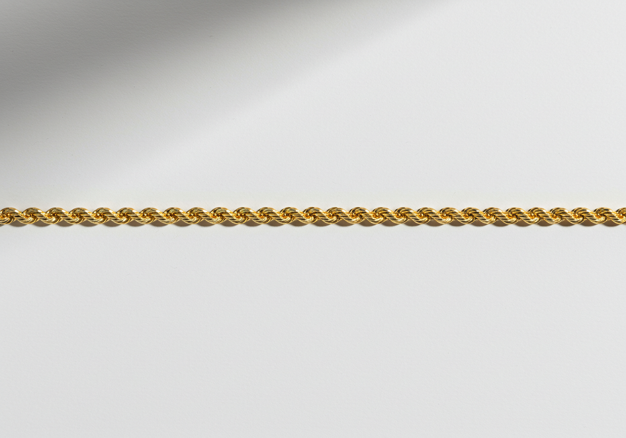 Alt=" banner picture showcasing a stunning design of a gold rope chain"