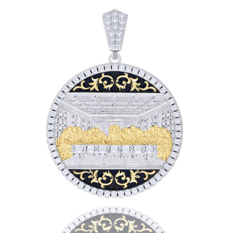 The Baguette Round Moissanite Last Supper Pendant features gold and silver artwork, ornate black and gold detailing, a clear stone border, and a triangular moissanite-encrusted bail for extra brilliance.