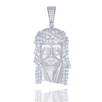 The Baguette Round Moissanite Jesus Religious Pendant is a 925 Sterling Silver bearded face with clear sparkling stones and a crown of thorns, resembling Jesus; it's an elegant religious jewelry piece shown on a white background.
