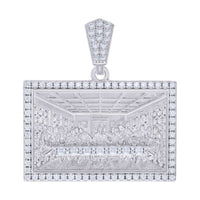 The Baguette Round Moissanite Last Supper is a rectangular sterling silver pendant adorned with shimmering moissanite stones and features an engraved depiction of Leonardo da Vinci’s masterpiece with a sparkling border and bail.