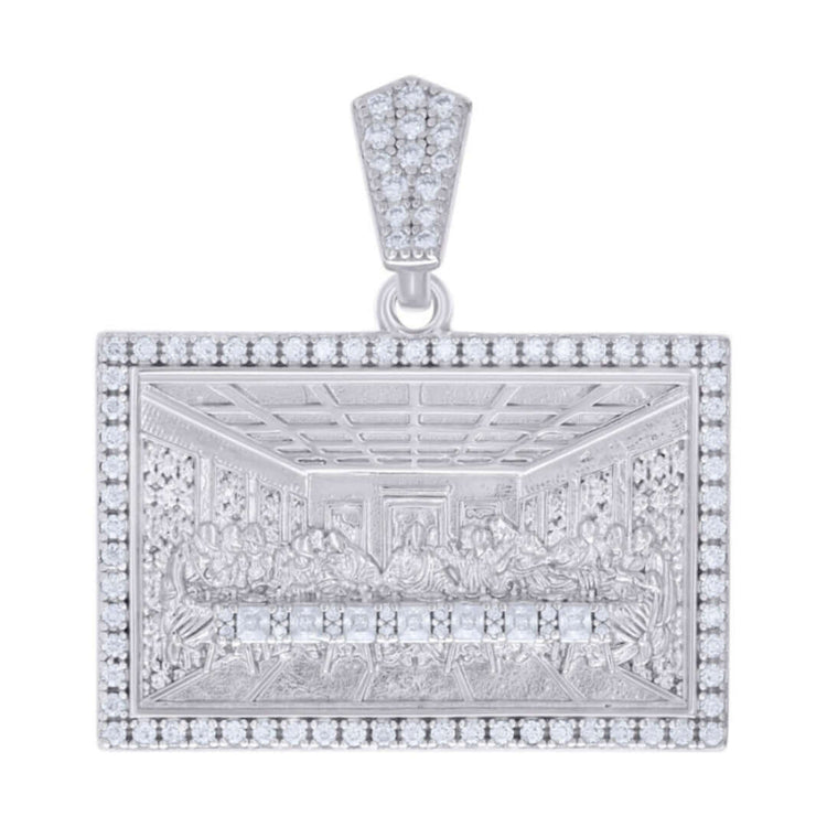 The Baguette Round Moissanite Last Supper is a rectangular sterling silver pendant adorned with shimmering moissanite stones and features an engraved depiction of Leonardo da Vinci’s masterpiece with a sparkling border and bail.