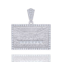 The Baguette Round Moissanite Last Supper is a rectangular sterling silver pendant featuring an engraved Last Supper scene and diamond accents, with a decorative bail for attaching to a necklace.