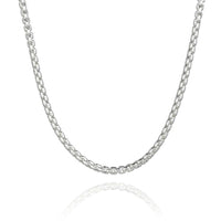 The Box Chain White Gold - 2mm features small, rounded links in a minimalist design, displayed against a white background. The chain gently curves, and its delicate reflection is visible beneath it.