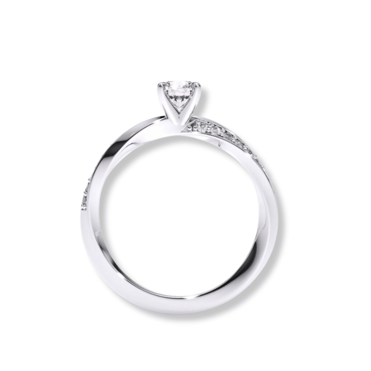 The Brilliance Eternity Lab Grown Diamond Engagement Ring for women in silver features a round lab-grown diamond solitaire with accent diamonds on the band, shown on a white background.
