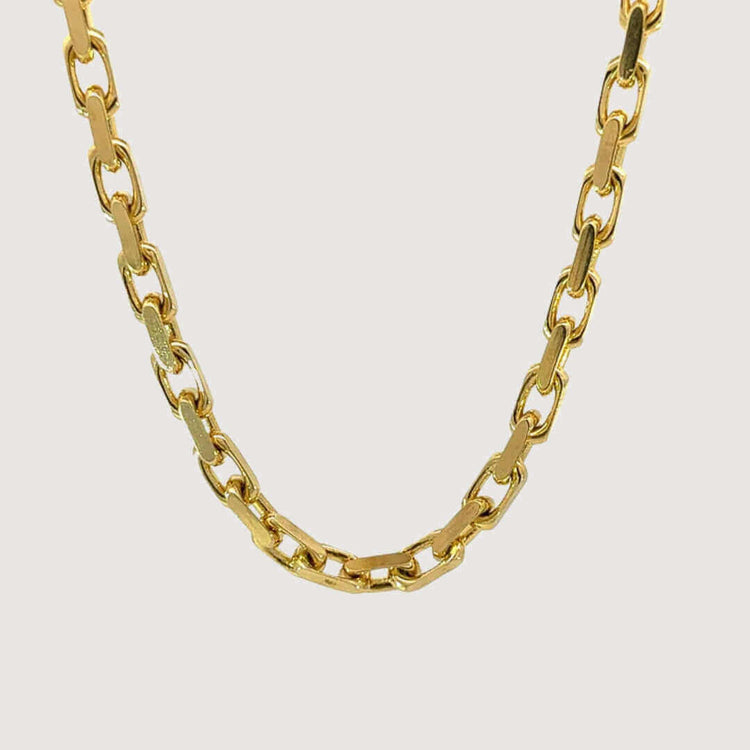 A close-up of the Cable Link Chain - 5mm, a men's gold chain featuring oval-shaped cable links, displayed against a plain, light background.