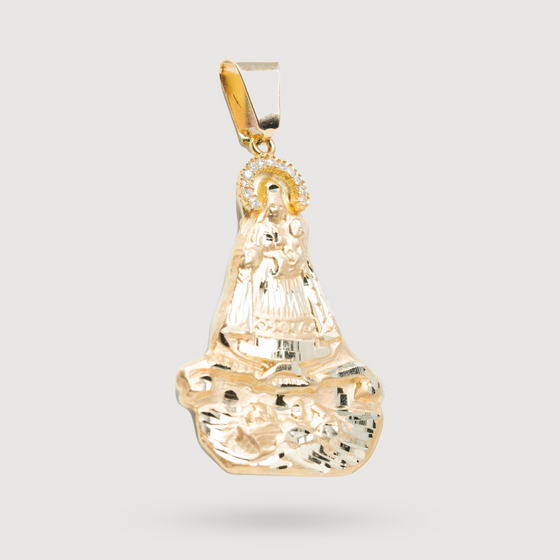 Shop this 14k Solid Yellow Gold Caridad Del Cobre Pendant with CZ Stones.