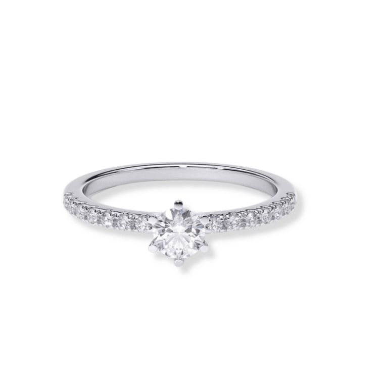 The Classic Solitaire Lab Diamond Ring with Dazzling Pavé Accents in white gold features a round lab diamond center and pavé side stones, showcased on a white background—ideal for those seeking elegant women's engagement rings.