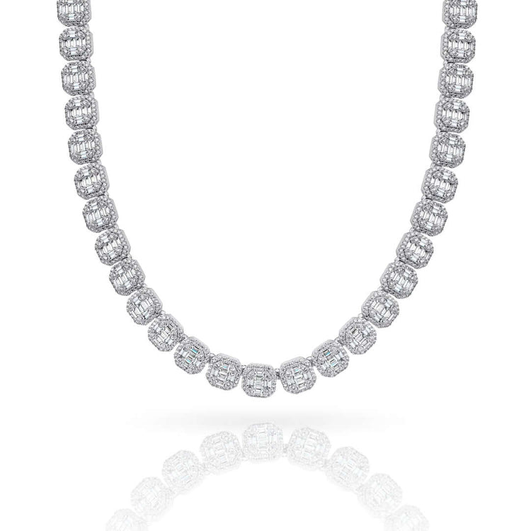 The Cluster Tennis Chain 14k - 11mm is a gold necklace with round, bead-like segments encrusted with small diamonds in a continuous, elegant strand, shown against a white background.