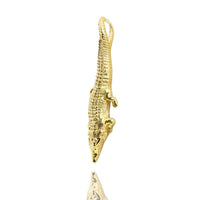 The Crocodile Pendant - 14k Solid Yellow Gold is displayed on a white background, showcasing its detailed textured body and top loop—an eye-catching piece for any yellow gold jewelry collection.