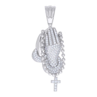 The Cross Praying Hands Symbol Religious Charm Pendant is crafted in 925 sterling silver, with two praying hands adorned with VVS moissanite stones, holding a beaded rosary that ends in a diamond-encrusted cross.