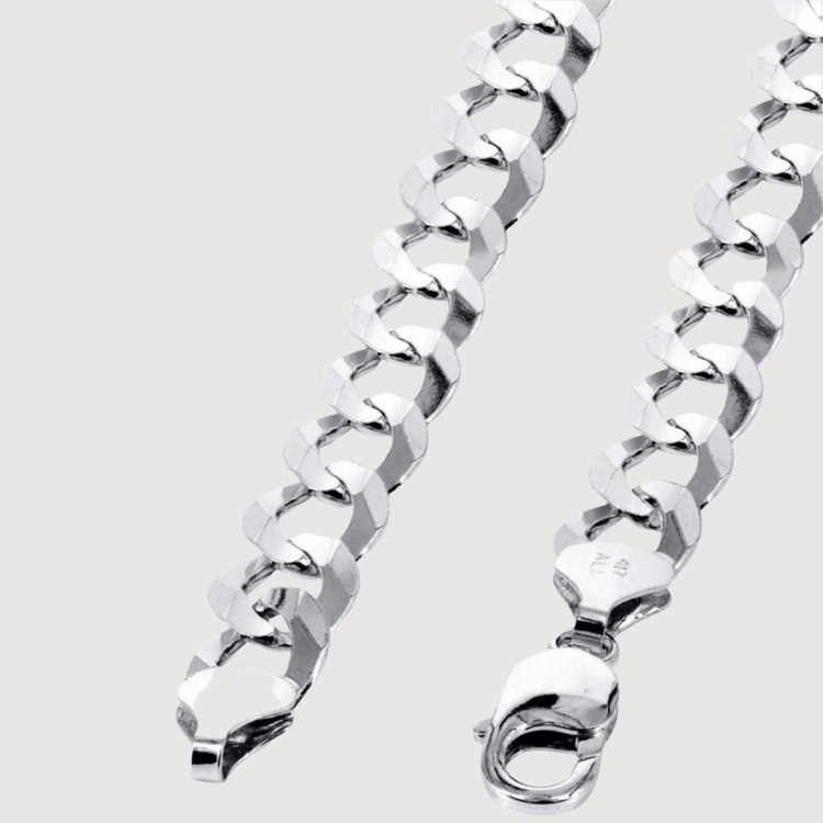Close-up of a shiny Curb Link Chain - 2mm-5mm Solid White Gold bracelet featuring rectangular and angled links, shown with a lobster clasp fastener on a plain light background.