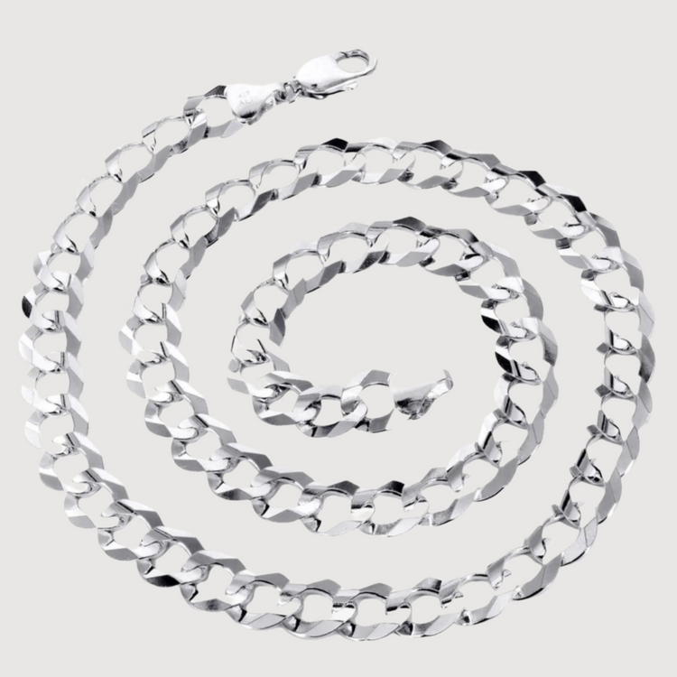 The Curb Link Chain - 6mm-9.5mm Solid White Gold features large, flat interlocking links and a lobster clasp, coiled in a spiral on a plain light gray background.