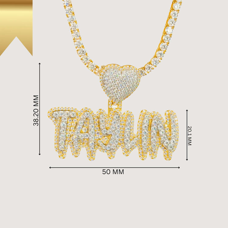 The Custom Diamond Name Pendant - Solid Yellow Gold features a heart-shaped and personalized TAYLIN name plate, both encrusted with diamonds. Dimensions: 38.20 mm high, 50 mm wide, heart measures 20.1 mm.