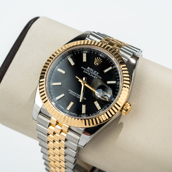 41mm Rolex Two tone - Black Stick Dial Datejust Ref: 126333Discover elegance with the Rolex Oyster Perpetual Datejust. Features a two-tone gold and steel design, fluted bezel, black dial, and Jubilee bracelet for timeless sophistication.