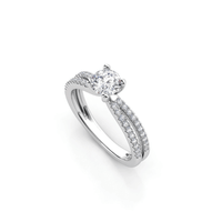 The Double-Band Lab Diamond Engagement Ring with Brilliant Round Center features a round solitaire lab diamond and small accent diamonds on a split white gold band, displayed on a white background.