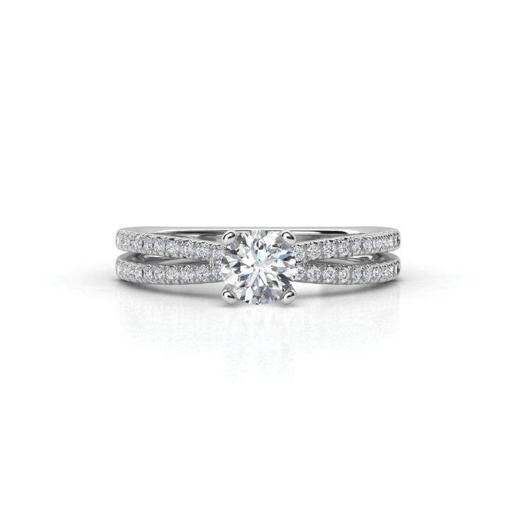 The Double-Band Lab Diamond Engagement Ring with Brilliant Round Center features a round center stone and small diamonds along both bands, shown on a white background.