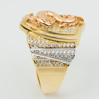 The Dragon Shield Ring - 10k Solid Gold features a raised dragon design, pavé-set gemstones on the face and band, and two silver-toned accent lines with extra stones—making it a bold statement piece for men.