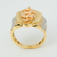 The Dragon Shield Ring – 10K Solid Gold features a raised dragon on a shield-shaped top, accented with clear stones and intricate patterns. Polished gold and rose gold tones make this men’s ring a bold statement piece.