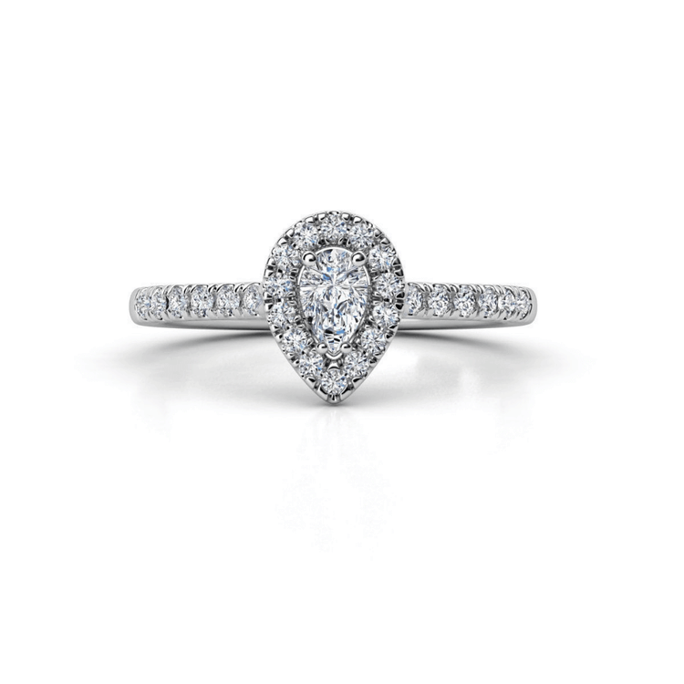 The Elegant Pear-Shaped Lab Diamond Halo Ring is a white gold women’s engagement ring featuring a pear-shaped center stone, lab diamond halo, and diamonds set along the band for a sparkling, refined look.
