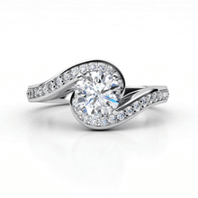  alt=" Discover the Elegant Swirl Halo Lab Diamond Ring. A stunning women’s engagement ring featuring a 1.75 CT round lab diamond with a halo in a 14K gold swirl band. "