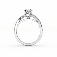 A side view of the Elegant Swirl Halo Lab Diamond Ring showcasing a round brilliant lab diamond in a swirl halo setting with a polished, elegant band.