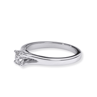 The Elegant Tapered Band Lab Diamond Engagement Ring features a single round-cut diamond set in a sleek silver band, displayed in a side profile on a white background.